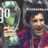Pixelated static image of a person in sports attire holding a soccer ball with visible number 10, set against dark background.