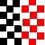 Black and white checkered pattern with red squares on the right, one yellow square in the black section.
