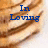 A static image with blue text reading "In Loving Memory Of..." and "Flapjack <333" over a brown striped background.