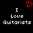 Red pixelated heart symbol above white text reading "I Love Guitarists" on black background.