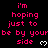 Pixelated text repeats 'i'm hoping just to be by your side' with white hearts on black background, some text has 'yourbe' typo.