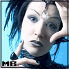 A person with dark blue hair and a black top holds hands near their face against a light blue background, displaying two distinct eye states.