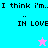 Pixelated text reads "I think i'm.." followed by "IN LOVE" with a pink star on cyan background and blue star on pink background.