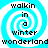 A pixelated image with four identical spiral patterns in cyan and white, each containing the text "walkin in a winter wonderland" in black pixelated font.