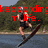 Animated sequence showing a person performing water skiing with a wakeboard on a lake, wearing a black sleeveless top and white helmet, with red text overlay reading "keboarding HYPERLITE ml life."