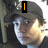 A pixelated image of a person wearing a dark cap with text overlays reading 'I', 'LOVE', and 'MIKEY!' with an orange heart symbol.