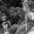 Black-and-white pixelated image of two figures in an embrace, with text reading 'Kairi' and 'Sora' separated by a heart symbol on the right side.