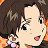 A 48x48 pixel buddy icon featuring a close-up of an anime-style character with brown hair and pink lips on the left, paired with "Anime IM" text in white stylized font on a black background on the right.