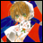 Pixelated anime-style character with light brown hair and green eyes, wearing a blue and red outfit with white accents, holding a white object with green details against a red and blue background.