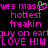 Pixelated text in bright pink and green on black background, with repeated phrases and a small green animation element.