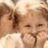 Two figures in close proximity with one figure's hand near the other's face, rendered in a pixelated style with warm brown and beige tones.