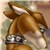 Brown-furred anthropomorphic character with green eyes, wearing a dark collar with silver accents, head tilted upward in profile view.