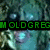 Pixelated green text on black background reads 'MOLDGREG' and 'DO YOU LOVE ME?' over blurred teal and gray abstract shapes.
