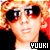 Pixelated static image of a person with red-tinted sunglasses, orange hair, and black clothing featuring the text "YUUKI" in white block letters at bottom right.