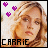 A 48x48 pixel animated buddy icon featuring a woman's face with blonde hair, purple hearts on the left frame and blue hearts on the right frame, and "CARRIE" text at the bottom.