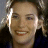 A split-frame contact sheet showing a pixelated portrait of a woman on the left and blue text reading "jersey girl" on the right, with visible dithering and low-resolution artifacts.