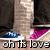 A pixelated image of two shoes on a brick background with text and heart symbols.