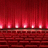 Red background with a stage curtain and brick wall image, text reads 'Theatre is my life!' in pixelated font.