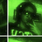Pixelated green-toned image of a character with dark hair and glowing eyes, set against a bright green background with partial text at the bottom.