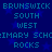 Blue background with repeating star pattern and pixelated text reading BRUNSWICK SOUTH WEST PRIMARY SCHEIMARY SCH ROCKS in two identical vertical
