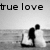 Black-and-white pixelated image of two figures embracing on a beach with 'true love' text above, showing animation changes in figure positioning and background brightness.