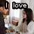 A four- shows a man and woman in a room with white curtains; text overlays change across to form "I love You Daddy"