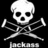 Pixelated white skull with black eye sockets and nasal cavity over crossed bones on black background, with partial text below.