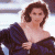 A pixelated image of a woman with brown hair wearing an off-shoulder dark blue dress, positioned next to green text reading 'Original Icons .com' on a solid background.