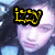 Pixelated icon with yellow 'i' and 'z' letters on black background, over blurred face with blue and purple tones.
