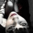 pixelated frames showing a person with dark hair and red lips in a dark setting, with text overlays changing across frames