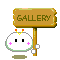 Pixel art of a white rounded character with black eyes and pink cheek marks holding a wooden sign reading 'GALLERY' against a gray background.