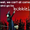 A pixelated witch figure in dark clothing and a pointed hat raises one arm against a red background with text above.