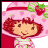 Strawberry Shortcake cartoon character in pink hat with strawberry and green leaves, standing against white background on black contact sheet grid.