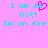 Pixelated cyan text on pink background with a pink heart symbol replacing 'so' in 'I am so hott Im on fire' repeated twice.