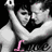 Two people embrace in a pixelated black-and-white image on the left, with red text on a blue background on the right.