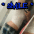 Pixelated image with blue text 'SMILE' and two blue dots on a blurred background showing a person's face and shoulder.