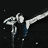 Animated sequence of a figure in dark clothing performing a dynamic pose with arms raised against a black background.