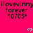 A bright pink background displays repeated text and heart symbols with a gray overlay in the bottom-right corner.
