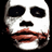 A pixelated face with white skin, black eyes, and red lips appears in three variations against a black background.