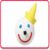 Pixelated cartoon face with yellow hair, blue eyes, black nose, and red smile on white background with pink border.
