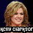 Pixelated image of a woman with light brown hair smiling, wearing purple clothing against dark and yellow backgrounds with overlaid text.