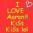 Red background with yellow pixelated text reading "I LOVE Aaron!! KiSs KiSs lol" and a light blue heart symbol above the word I.