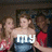 A group of people in formal attire with overlaid text changing across frames.