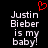 Black background with white pixelated text reading "Justin Bieber is my baby!" and a red pixelated heart symbol above the text.