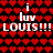 Red heart pattern background with white text reading "i luv LOUIS!!!" in two mirrored sections, each section containing a small red heart symbol replacing the 'u' in 'luv'.