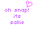 Pixelated purple text 'oh snap! its sallie' with a pink heart symbol above the exclamation mark on white background.