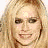 Four distinct pixelated portraits of a woman with blonde hair arranged in a , each showing different expressions and color treatments