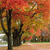 Pixelated autumn scene with dark tree silhouettes against warm orange and red foliage background, light-colored ground, and distant greenery.