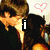 Animated icon shows two people kissing with a pink heart above them, then text 'i love you<33' appears over the image.