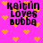 Pixelated text 'kaitlin loves bubba' on bright pink background with orange hearts, animated with shifting text and heart positions.